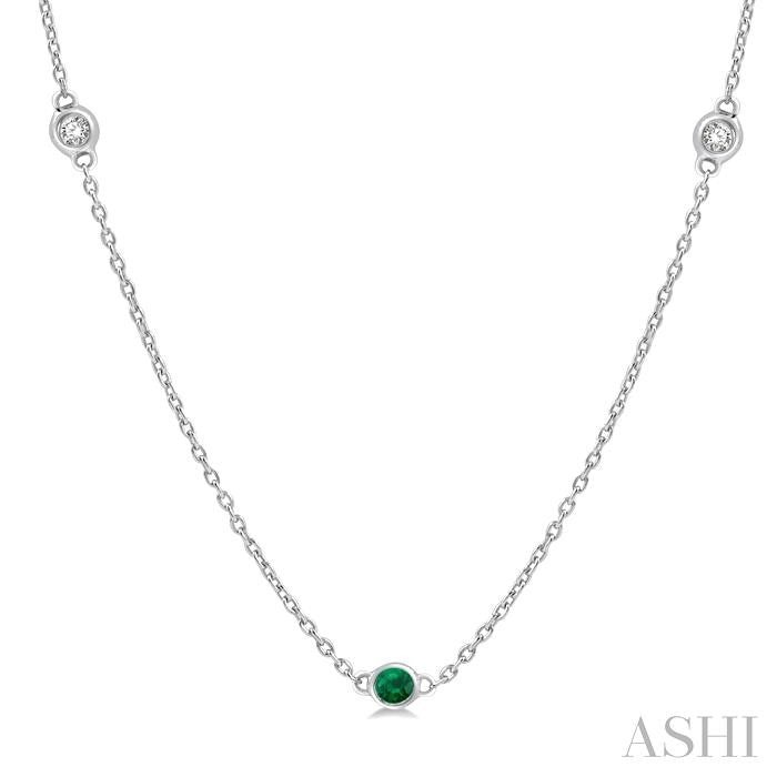 1.75 MM Emerald and 1/6 Ctw Round Cut Diamond Precious Station Necklace in 14K White Gold