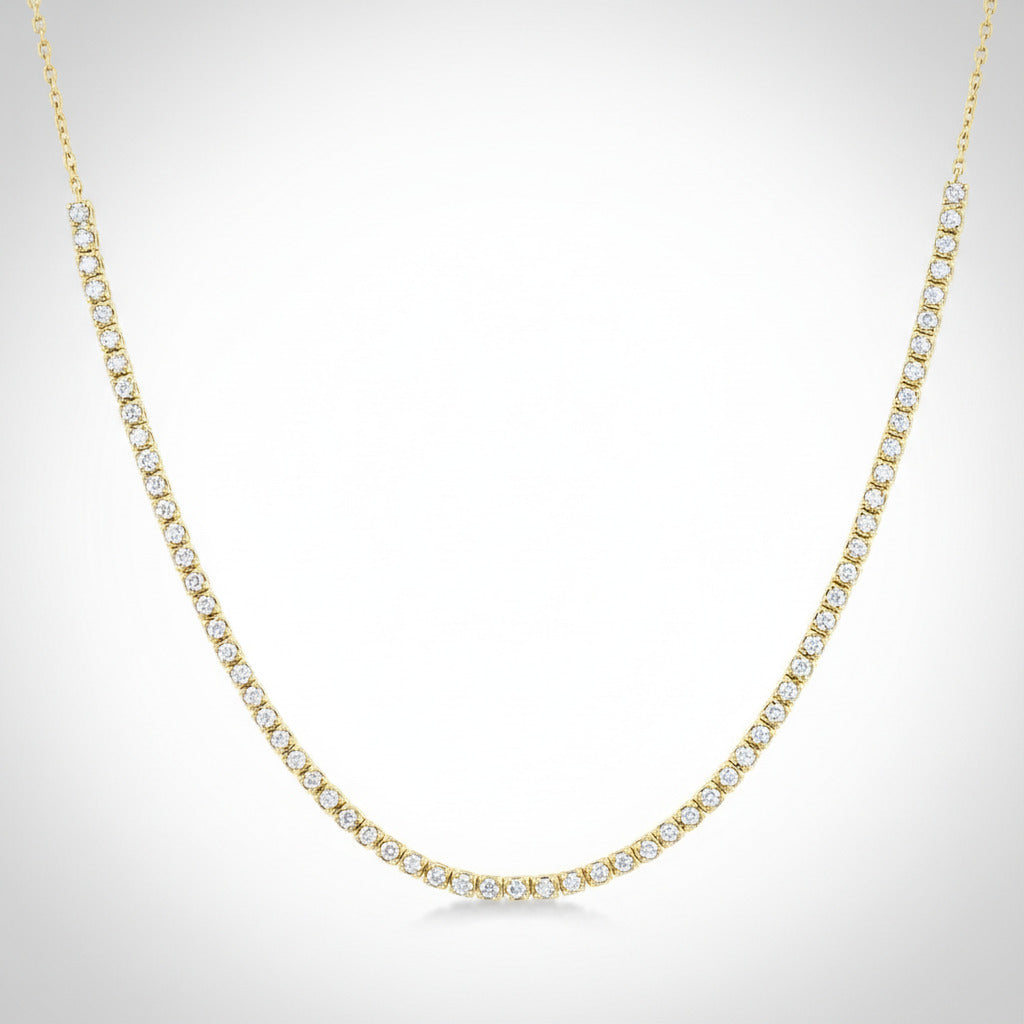 Gold necklace with diamonds on a white background