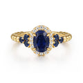 14K Yellow Gold Bujukan Diamond Halo and Oval Blue Sapphire Fashion Ring