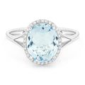 Front view diamond and blue topaz fashion ring white gold
