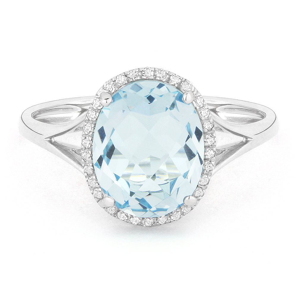 Front view diamond and blue topaz fashion ring white gold