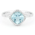 Front view diamond and blue topaz fashion ring white gold