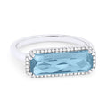 Front view diamond and blue topaz fashion ring white gold