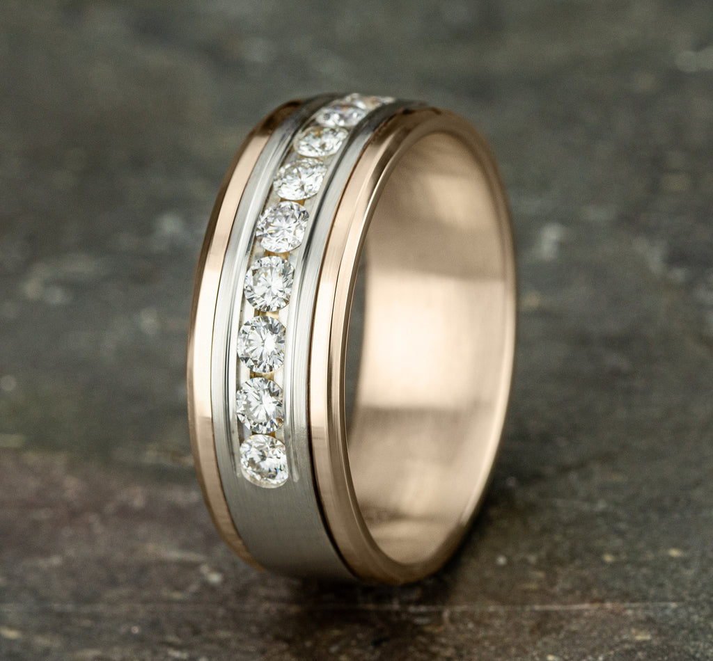 THE MARQUIS 8mm, Comfort fit, 14K Rose and White Gold, Satin center, polished bevel edges, 9 channel set diamonds, Carat weight is .72ct, Clarity SI1-2, Color GH
