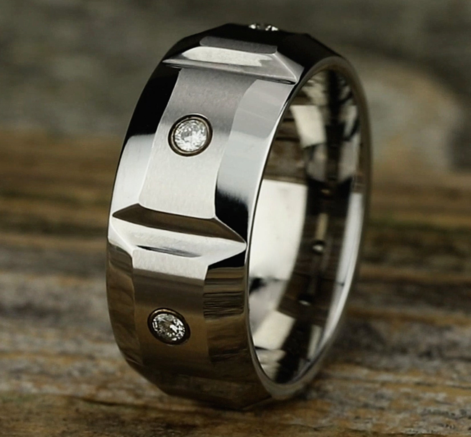 THE SIEGE 10mm, Comfort fit, White Cobalt, Satin finish with deep segmented cuts, 3 burnish set diamonds, Carat weight is .18ct, Clarity SI1-2, Color GH