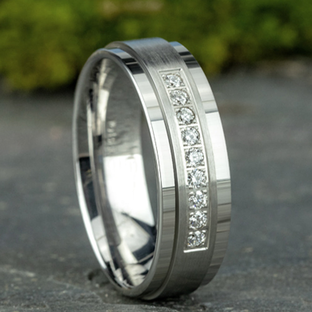 THE ARCHDUKE 7mm, Comfort fit, 14K White Gold, Satin finish, polished bevel edges, 9 pave set diamonds, Carat weight is .18ct, Clarity SI1-2, Color GH