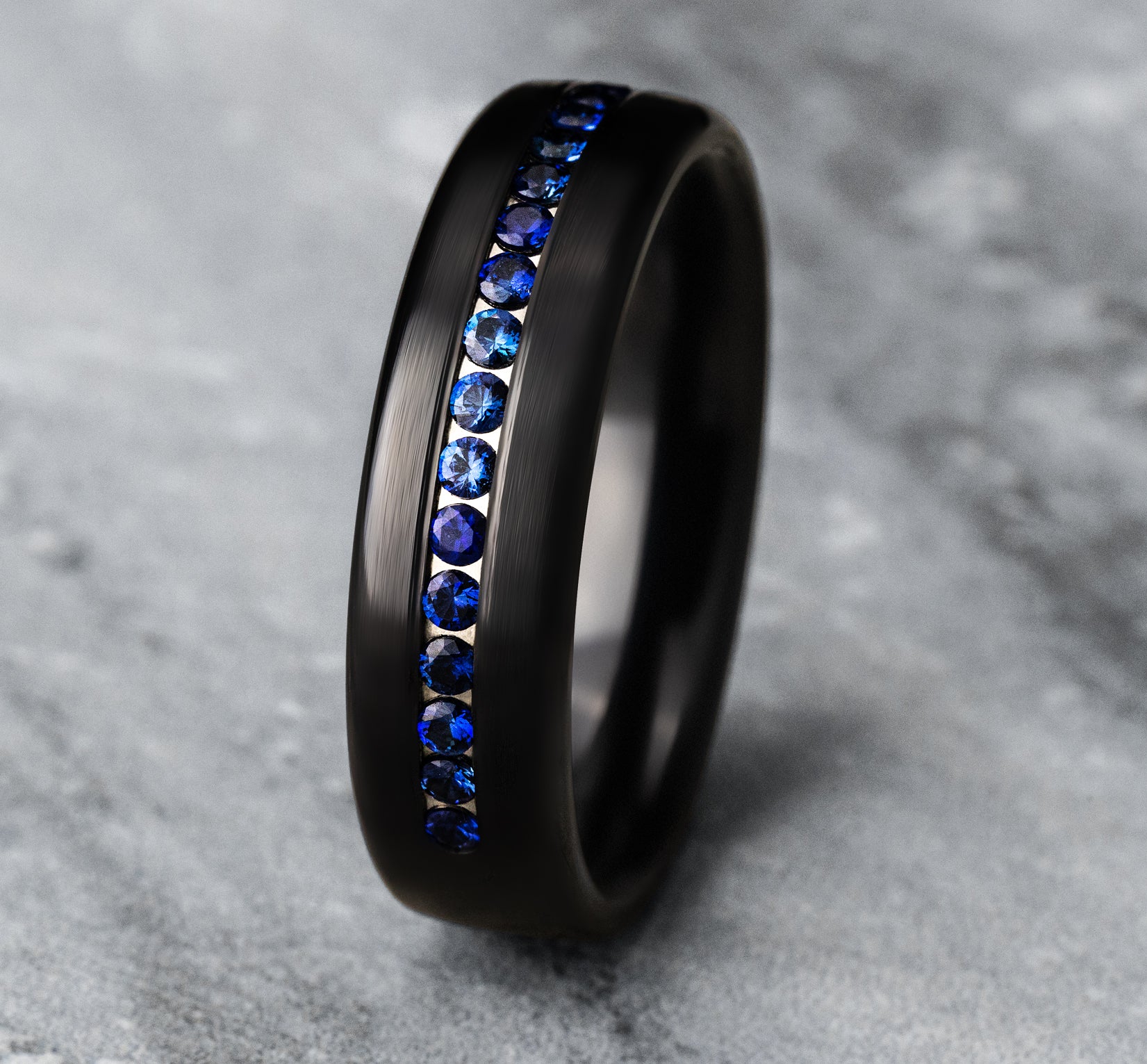 THE VISCOUNT 6.5mm, Comfort fit, Black Titanium, Satin finish, 20 channel set blue sapphires, Carat weight is .40ct