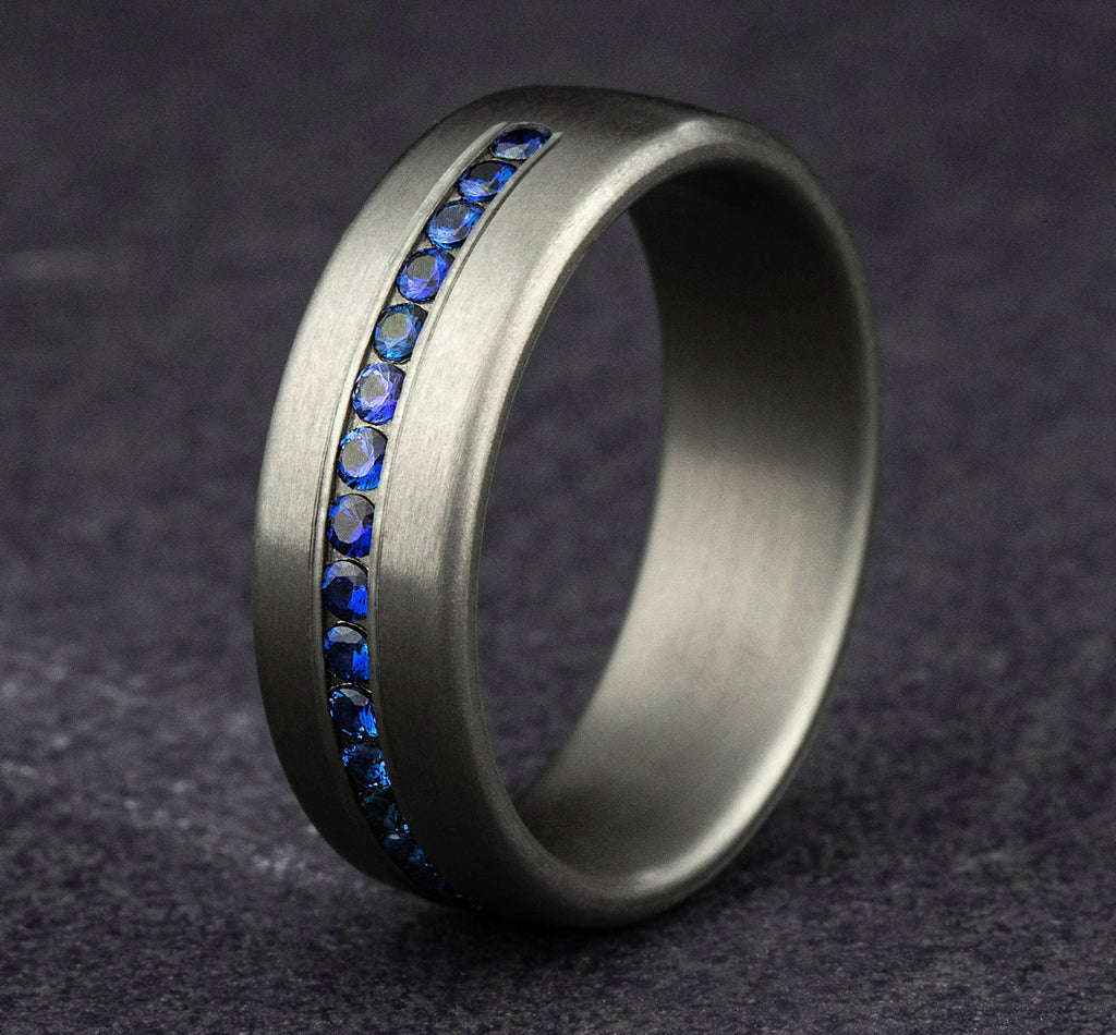 THE VISCOUNT 7.5mm, Comfort fit, Grey Tantalum, Satin finish, 20 channel set blue sapphires, Carat weight is .40ct