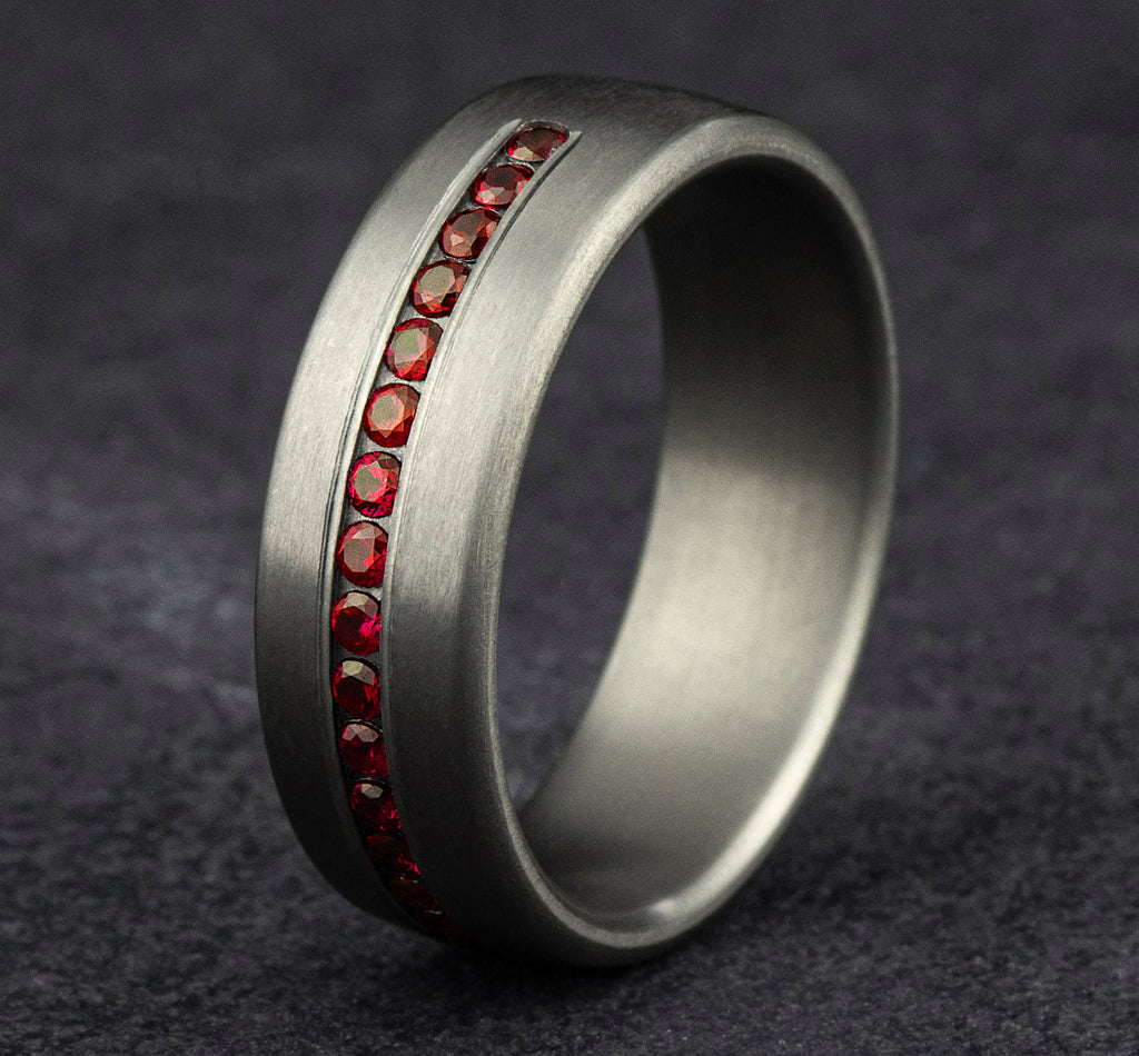 THE CARDINAL 7.5mm, Comfort fit, Grey Tantalum, Satin finish, 20 channel set rubies, Carat weight is .40ct