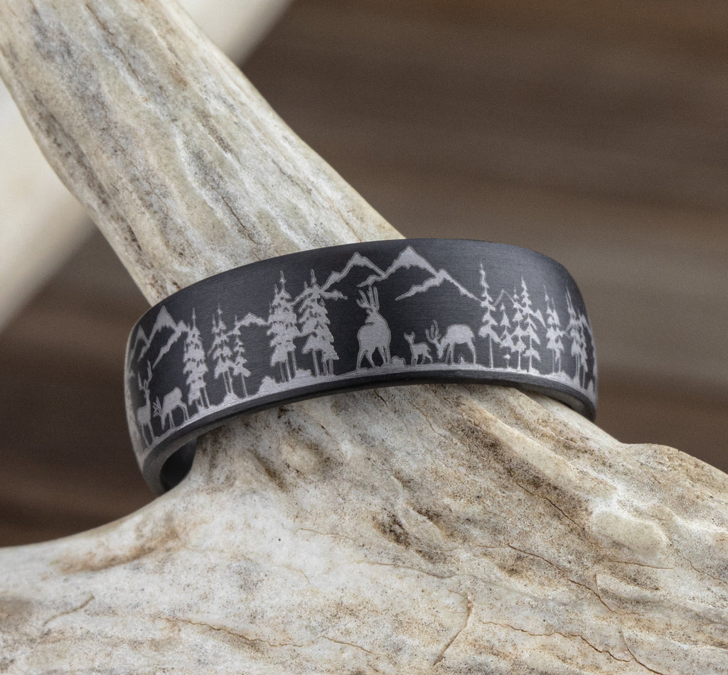 THE STAG 8mm, Comfort fit, Darkened Tantalum, Nature scene with mountains, deer, and trees