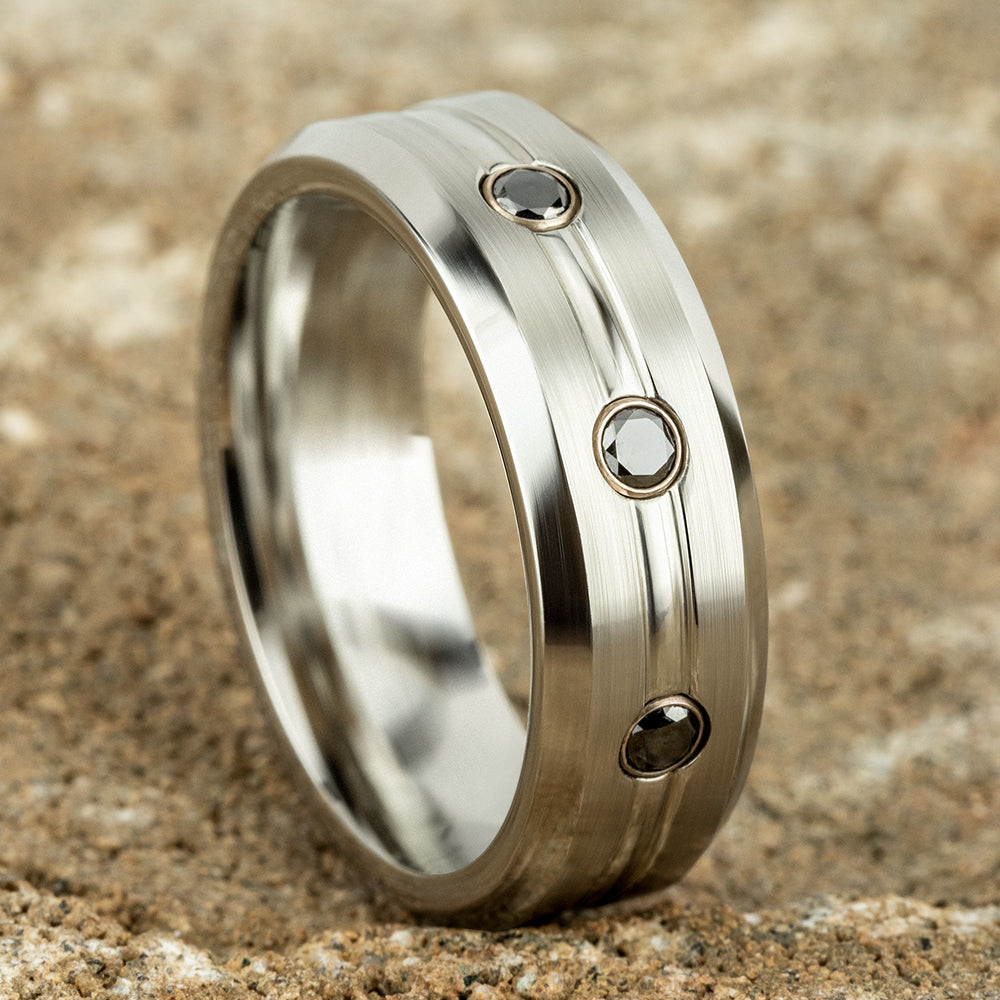 THE SABER 7.5mm, Comfort fit, White Cobalt, Satin center, polished double center cuts with black diamonds and bevel edges, 3 burnish set black diamonds, Carat weight is .20ct