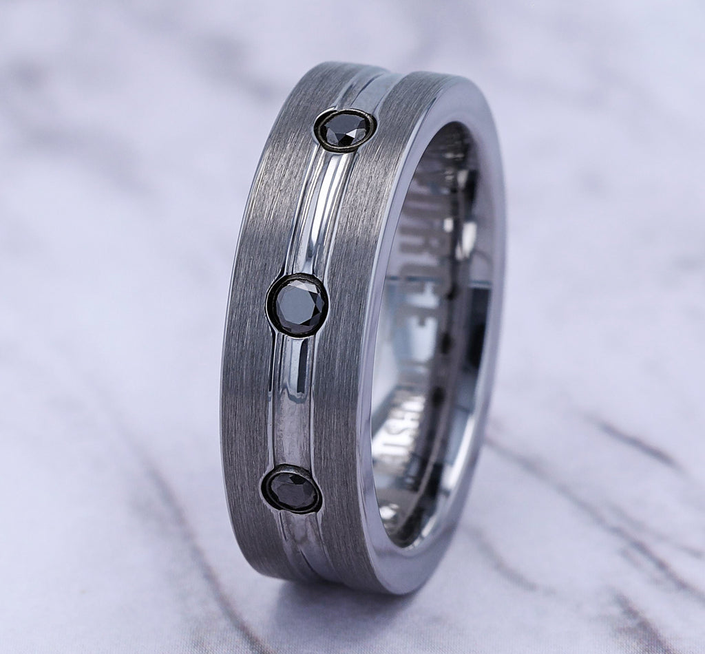THE QUINCY 7mm, Comfort fit, Tungsten, Satin center, polished double center cuts with black diamonds, 3 burnish set black diamonds, Carat weight is .20ct