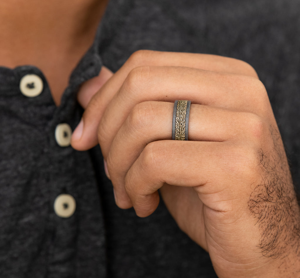 The Kestrel 8mm, Comfort fit, Grey Tantalum and 14K Yellow Gold, Feather patterned center with milgrain detail