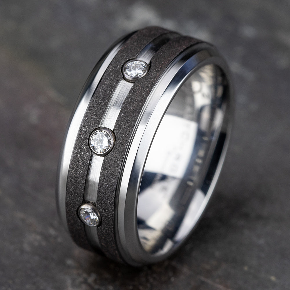 THE ARCHITECT 9mm, Comfort fit, White Cobalt, Graphite stripes, center diamonds with bevel edges, 3 burnish set diamonds, Carat weight is .20ct, Clarity SI1-2, Color GH