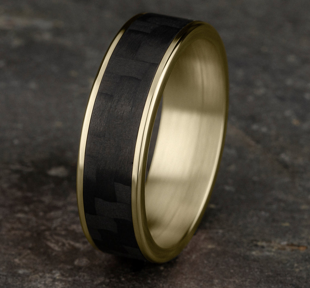 THE SCHUMACHER 6.5mm, Comfort fit, 14K Yellow Gold and Black Carbon Fiber, Twilled Carbon Fiber center, polished thin edges