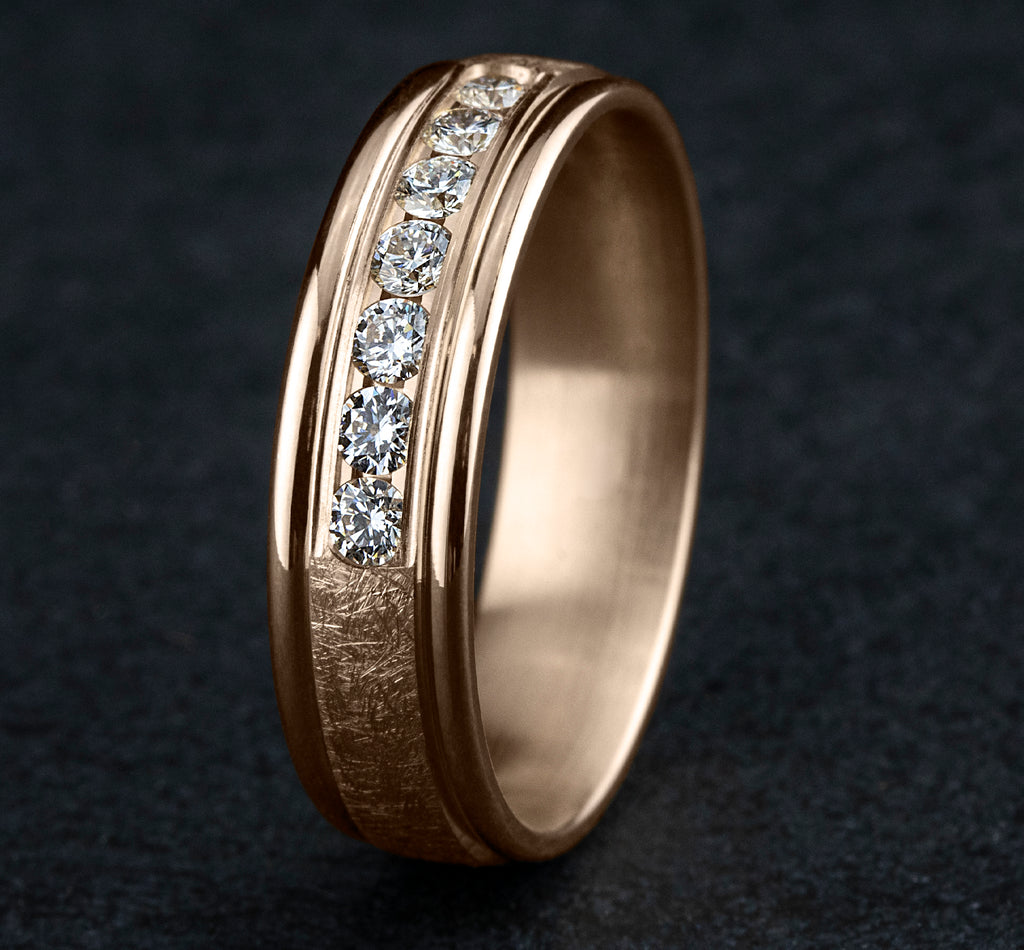 THE CAMBRIDGE 6.5mm, Comfort fit, 14K Rose Gold, Swirl finish, polished round edges, 7 channel set diamonds, Carat weight is .42ct, Clarity SI1-2, Color GH