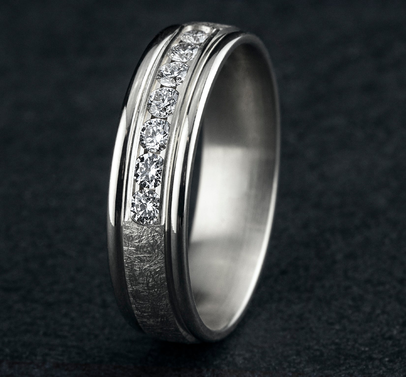 THE CAMBRIDGE 6.5mm, Comfort fit, 14K White Gold, Swirl finish, polished round edges, 7 channel set diamonds, Carat weight is .42ct, Clarity SI1-2, Color GH